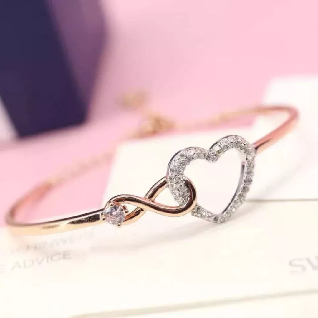 SWAROVSKI INFINITY HEART NECKLACE AND BRACELET SET ROSE GOLD