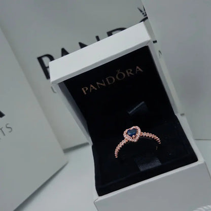 ANILLO DESLUMBRANTE PROMESA CORAZÓN AZUL PANDORA ROSE GOLD ZOCALO ONLINE