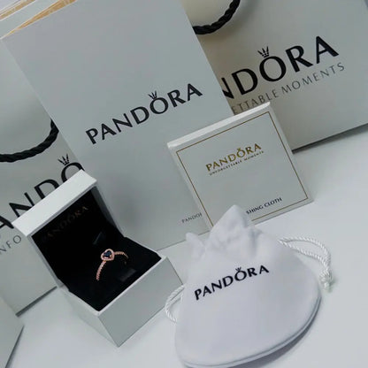 ANILLO DESLUMBRANTE PROMESA CORAZÓN AZUL PANDORA ROSE GOLD ZOCALO ONLINE