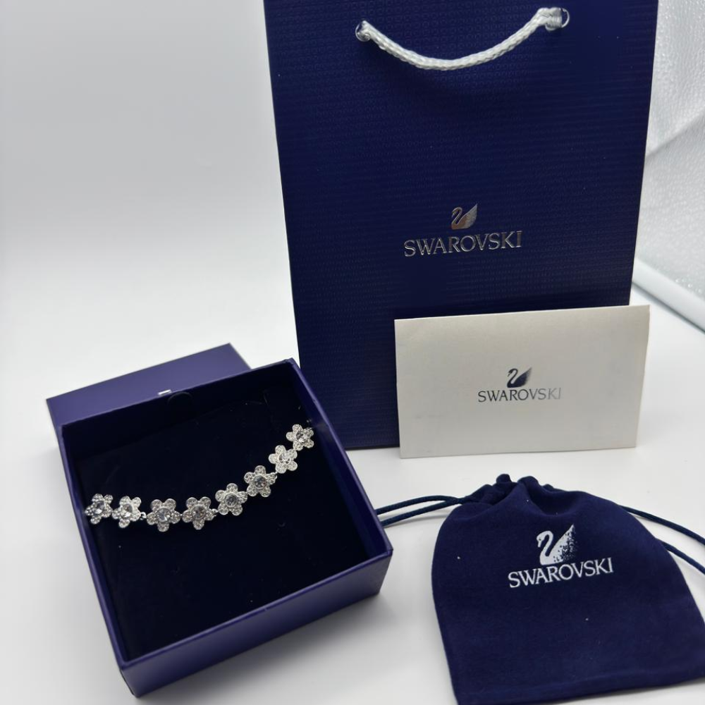 PULSERA BRAZALETE SWAROVSKI ARIANA GRANDE FLORES BLANCAS ZOCALO ONLINE