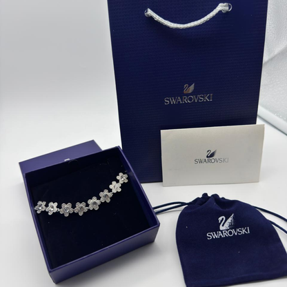 PULSERA BRAZALETE SWAROVSKI ARIANA GRANDE FLORES BLANCAS ZOCALO ONLINE