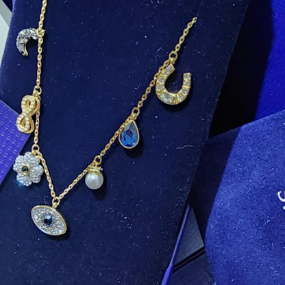 COLLAR GARGANTILLA SWAROVSKI SIMBOLICA LUNA INFINITO TREBOL OJO HERRADURA ORO